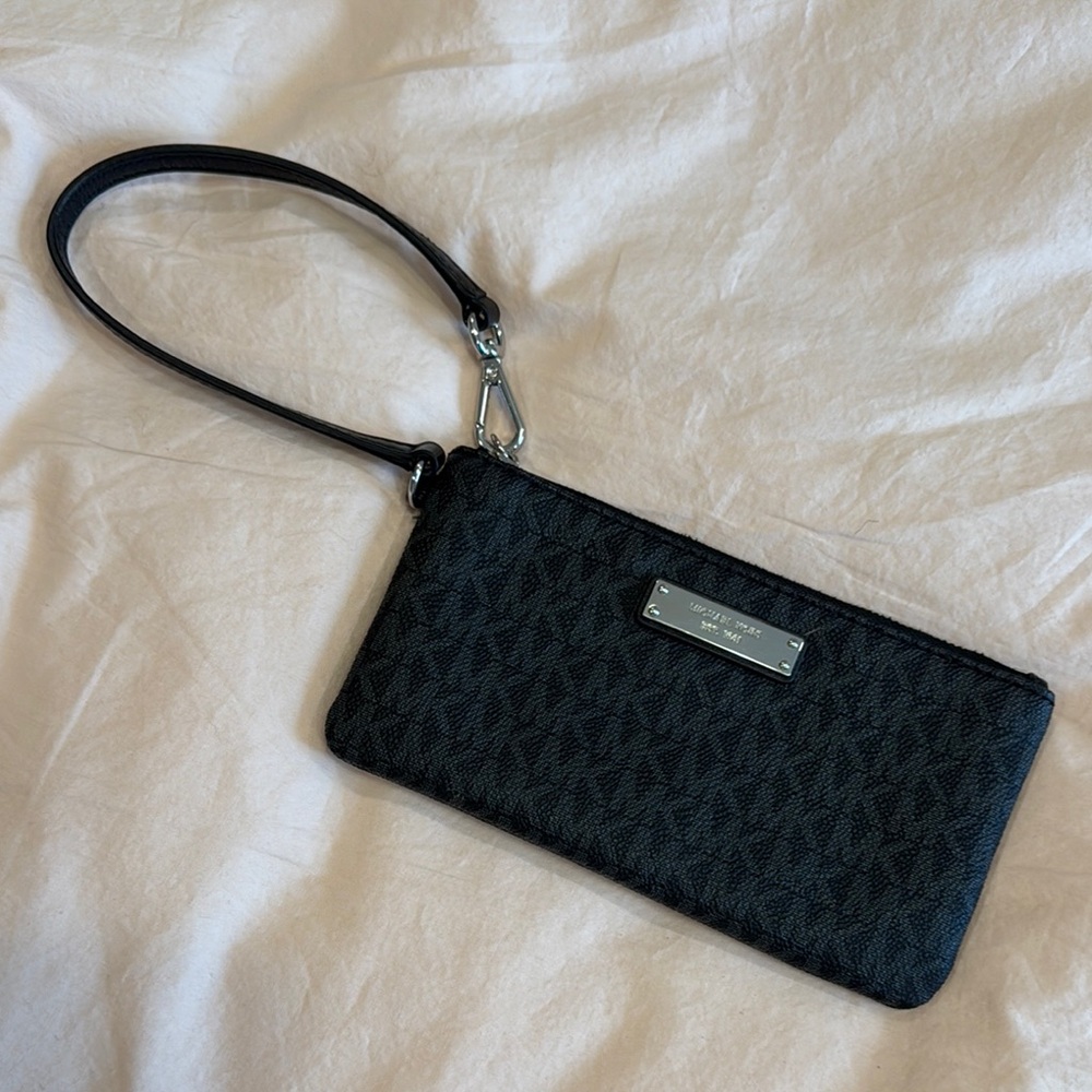 Michael Kors Black Clutch Sleek and Versatile